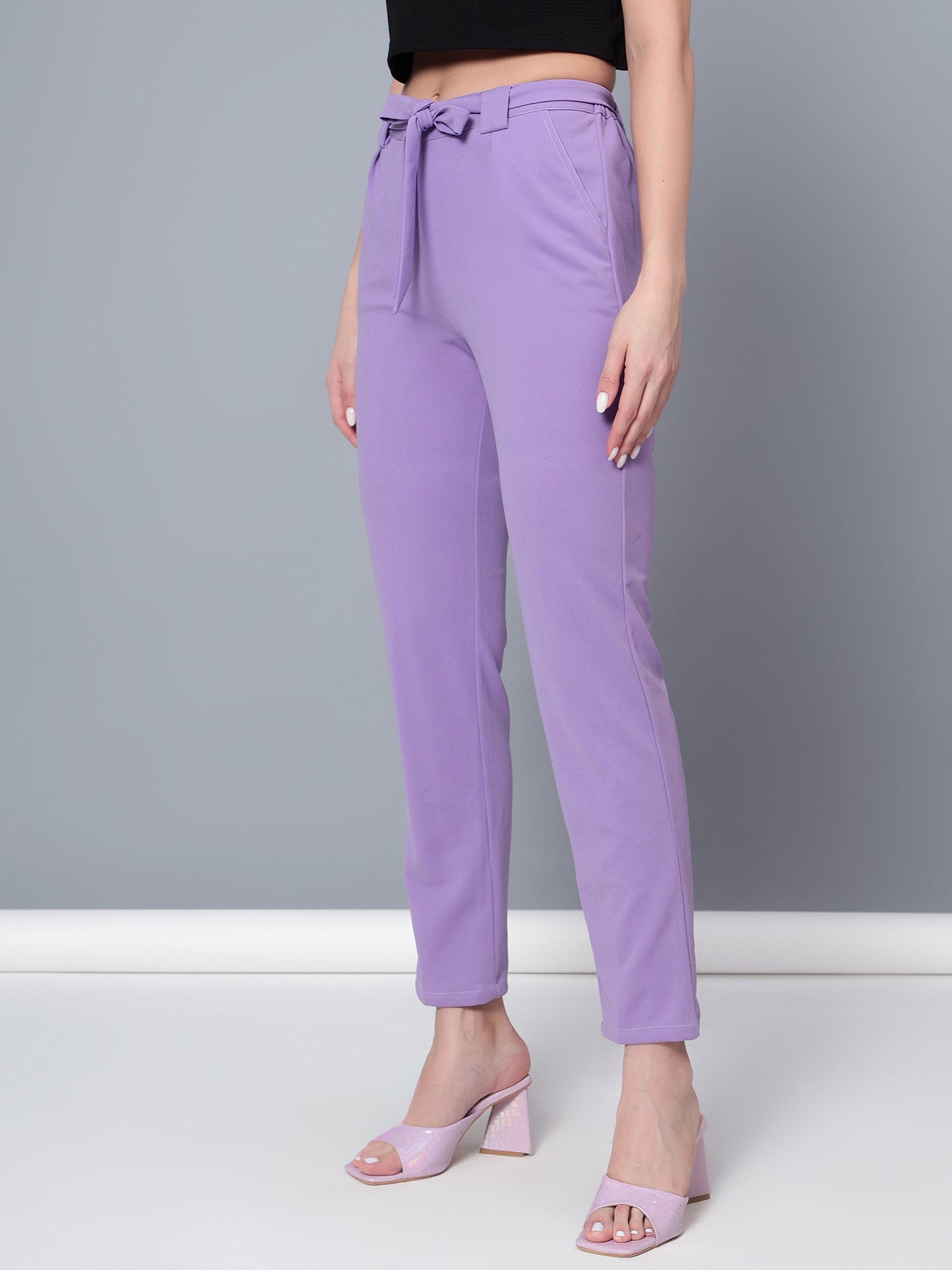 Golden Kite Women Purple Trouser is a stylish piece.Two Side Pockets ,Trouser Loops Belt Detail Women Casual pant
