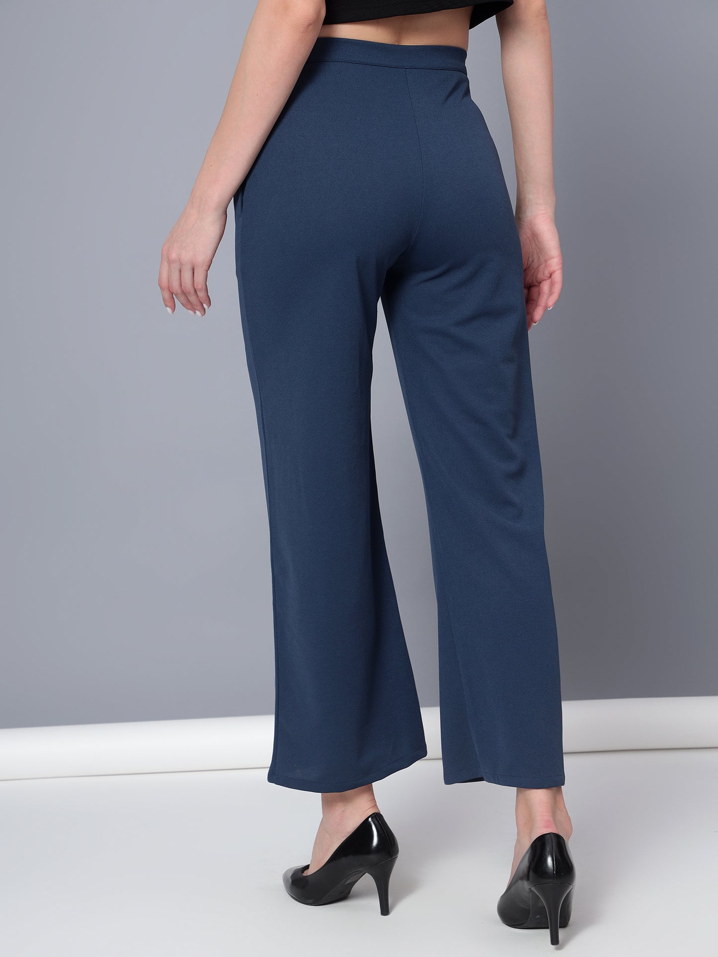 Golden Kite Solid High-Rise Trouser, has a elasticated waistband with button closure with zip fly & 2 pockets Casual Pant