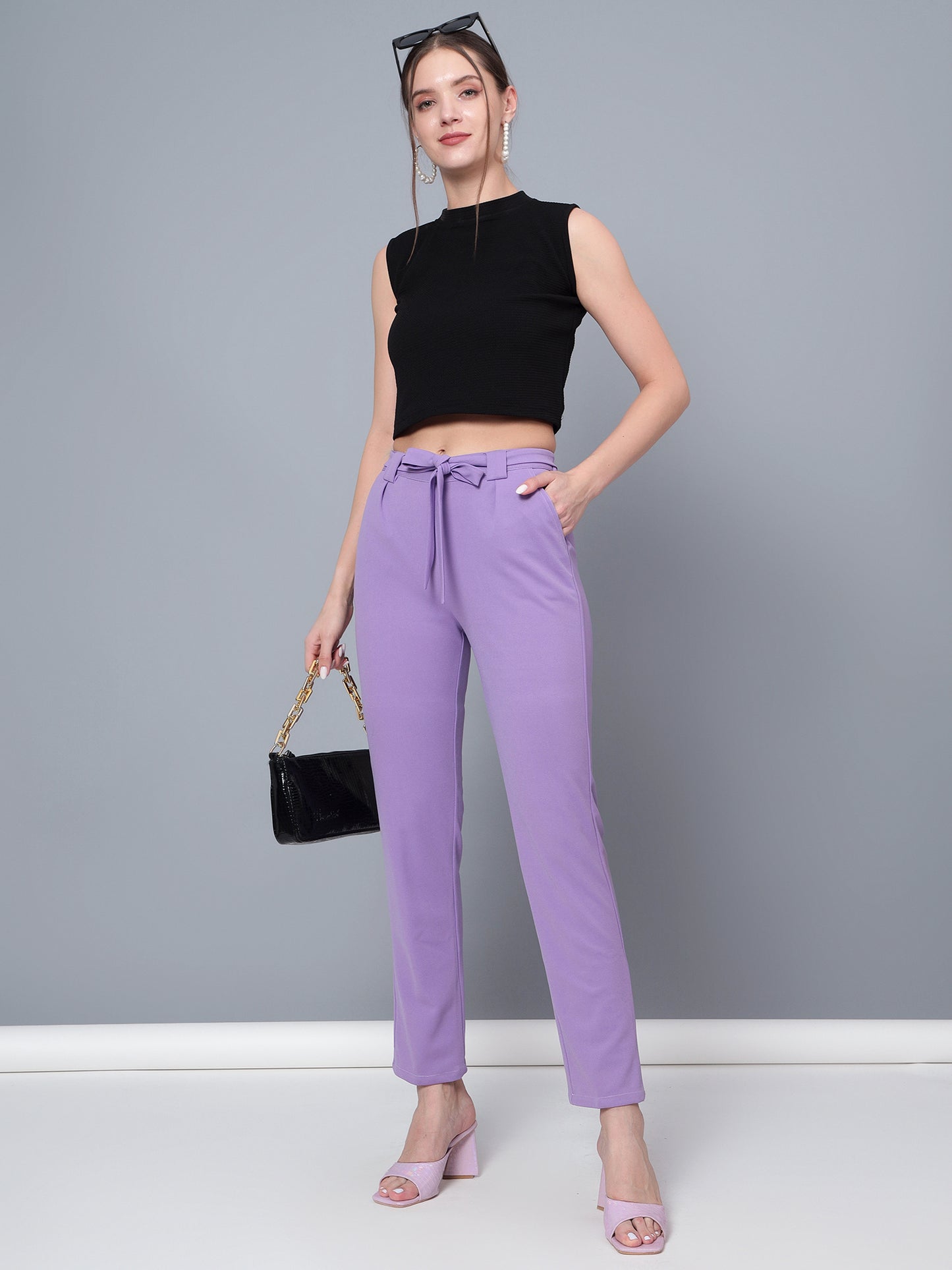 Golden Kite Women Purple Trouser is a stylish piece.Two Side Pockets ,Trouser Loops Belt Detail Women Casual pant