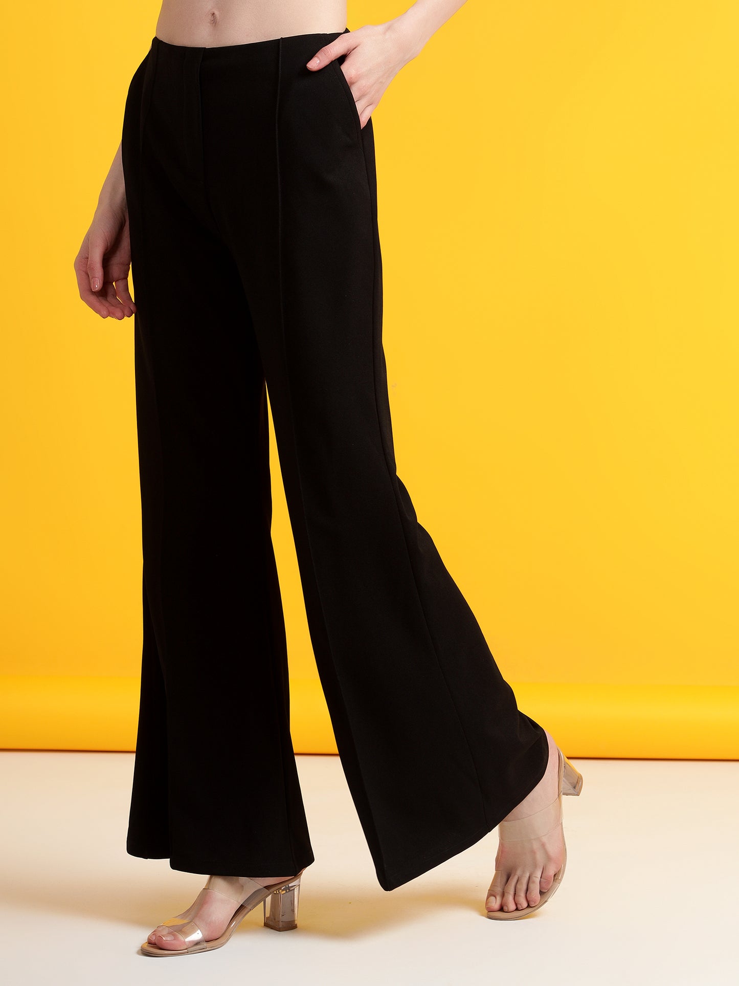 Golden Kite Black Solid High-rise regular-fit trousers, Flared bottom , slip on closure , and two Side pockets Women Pant