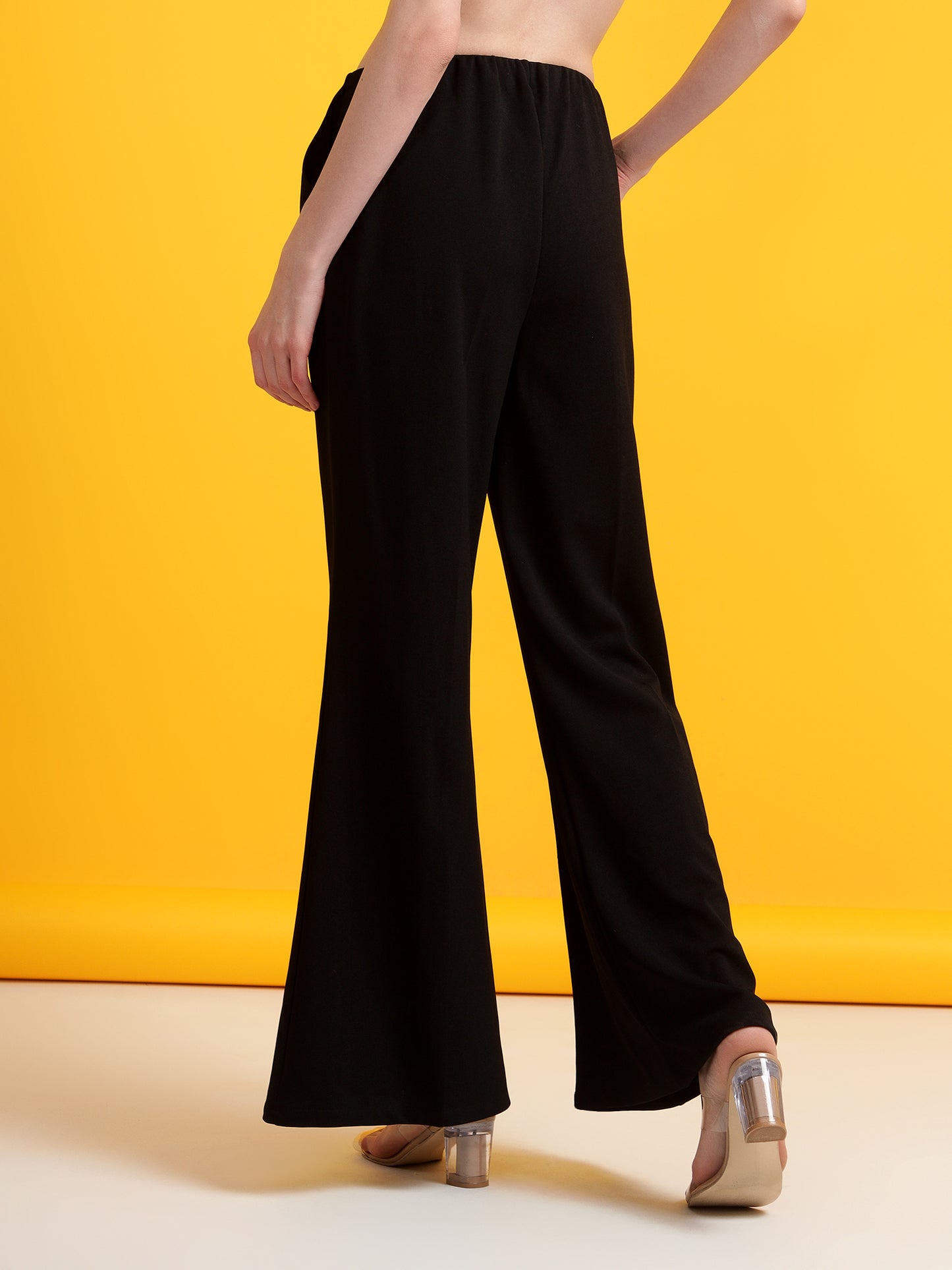 Golden Kite Black Solid High-rise regular-fit trousers, Flared bottom , slip on closure , and two Side pockets Women Pant