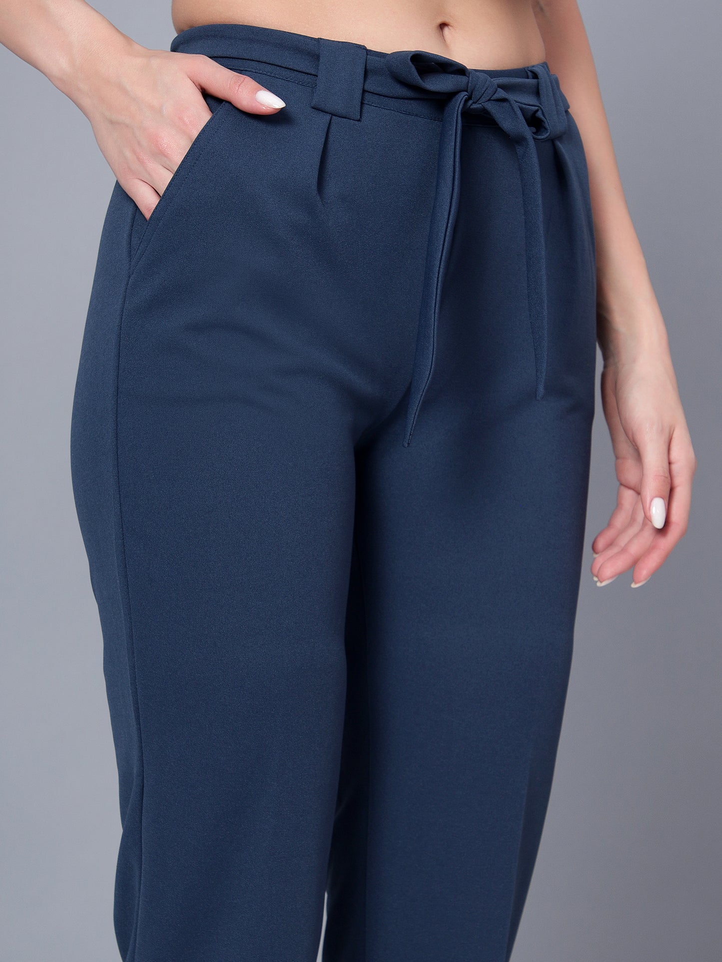 Golden Kite Women Purple Trouser is a stylish piece.Two Side Pockets ,Trouser Loops Belt Detail Women Casual pant