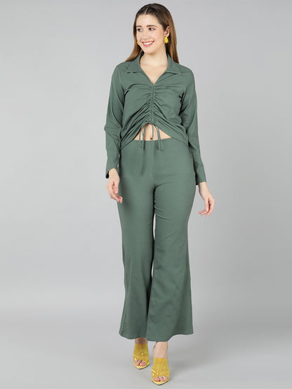 Golden Kite Green Solid Co-ordset , Collared shirt with a V-neck and long sleeves , featuring a gathered detail with adjustable ties at the front paired with flowing high waist trousers with an elastic waist band