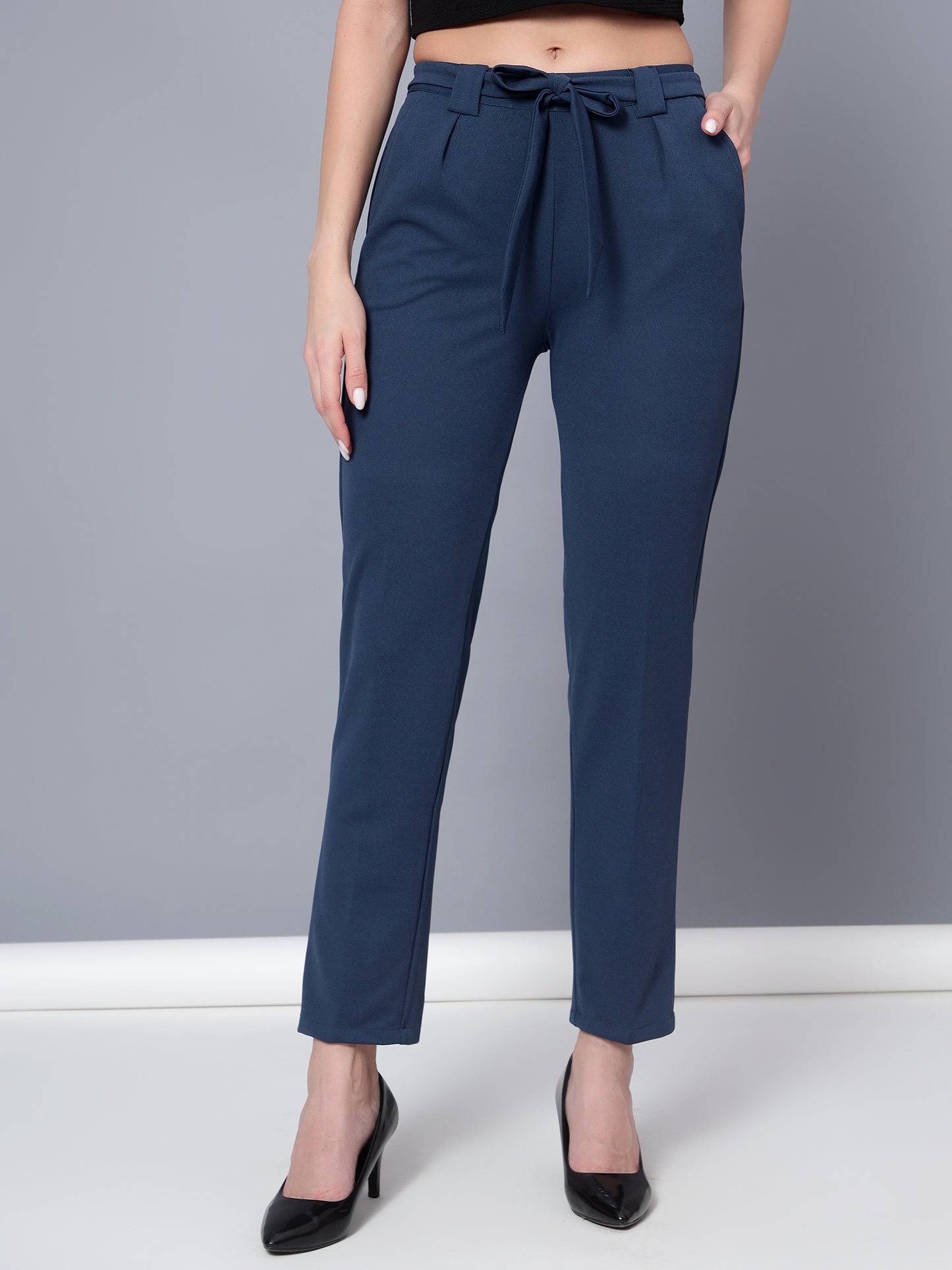 Golden Kite Women Purple Trouser is a stylish piece.Two Side Pockets ,Trouser Loops Belt Detail Women Casual pant
