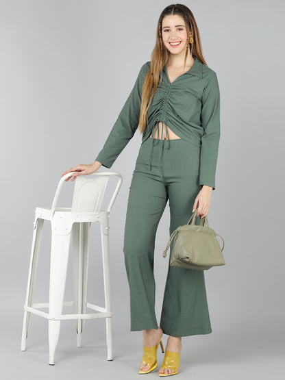Golden Kite Green Solid Co-ordset , Collared shirt with a V-neck and long sleeves , featuring a gathered detail with adjustable ties at the front paired with flowing high waist trousers with an elastic waist band